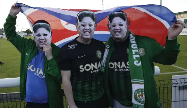  ??  ?? Bray Wanderers fans make fun of the Democratic People’s Republic of Wicklow at the Carlisle Grounds last Friday evening. Photo: Barbara Flynn