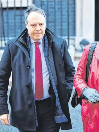 ??  ?? Downing Street: DUP deputy and Westminste­r leader Nigel Dodds and leader Arlene Foster in London yesterday.