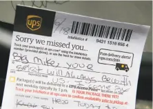  ?? Elijah Nouvelage / Special to The Chronicle ?? A “Sorry we missed you” UPS notice with a message for slain UPS driver Mike Lefiti lies on a growing makeshift memorial.