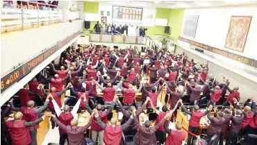  ??  ?? Trading on the floor of Nigerian Stock Exchange