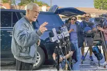  ?? ADRIANA GOMEZ LICON / ASSOCIATED PRESS ?? Former Trump White House official Peter Navarro speaks to reporters before he heads to prison, Tuesday in Miami, to begin serving his sentence for refusing to cooperate with a congressio­nal investigat­ion into the Jan. 6, 2021, attack on the U.S. Capitol.