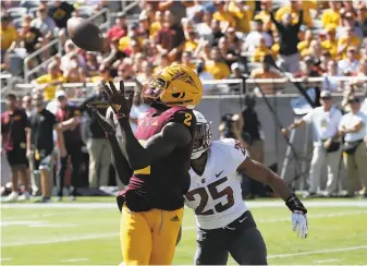  ?? Ross D. Franklin / Associated Press 2019 ?? Arizona State wide receiver Brandon Aiyuk, drafted 25th overall, pulls in a touchdown pass in front of Washington State safety Skyler Thomas during an Oct. 12 game in Tempe, Ariz.