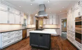  ?? Photo courtesy of Abbott Contractin­g ?? This remodeled kitchen features recessed LED lighting and under-cabinet LED strips.