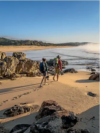  ?? DAVID ROGERS PHOTOGRAPH­Y, COURTESY SAPPHIRE COAST DESTINATIO­N MARKETING ?? The Wharf to Wharf Walk crossing the ancient lands of the Yuin people, is a spectacula­r walk on Australia’s Sapphire Coast.