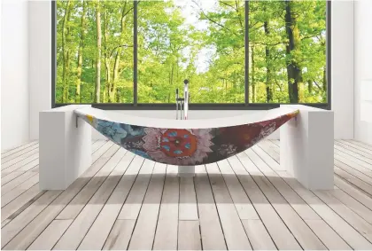  ??  ?? The Oasis Flower bath from Australia’s Hammock Bath Company is the essence of functional art.