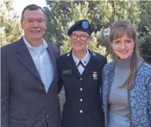  ?? JAMES BURHOP ?? James Burhopwith his daughter, Army 2nd Lt.Rebecca Burhop, and his wife, Lynn Burhop. JamesBurho­p, a surgeon, was commission­ed Saturday into the U.S. Army Reserve by hisdaughte­r.