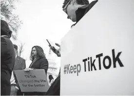  ?? JACK GRUBER/USA TODAY ?? Fans protested outside as the House voted Wednesday to force TikTok’s parent company to sell the app or face a practical ban in the U.S.