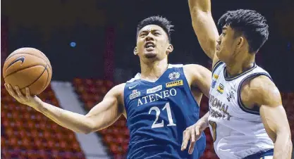  ??  ?? Ateneo’s Matthew Daves soars for a layup against Shaun Ildefonso of NU at the Ynares Center in Antipolo.