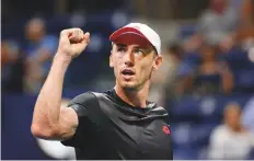  ?? AP ?? John Millman reacts after winning a point against Roger Federer of Switzerlan­d during the fourth round of the US Open early yesterday. The Australian won 3-6, 7-5, 7-6, 7-6.