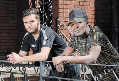  ?? JOHN RENNISON THE HAMILTON SPECTATOR ?? Hamilton Forge FC players Paolo Sabak, left, and Elimane Cissé are far away from home and in isolation.