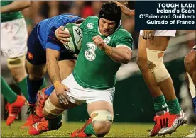  ??  ?? tough lad: Ireland’s Seán O’Brien and Guilhem Guirado of France