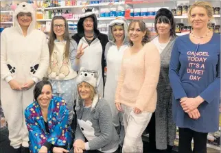  ?? PICTURE / DEBBIE BEADLE ?? SLUMBER STYLE: Orr’s Pharmacy staff in Kaikohe in their night attire, raising funds for Foster Hope.