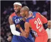  ?? BOB DONNAN/USA TODAY SPORTS ?? Kobe Bryant and LeBron James have some fun during the 2013 NBA All-Star Game.