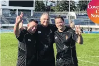  ?? PHOTO: SUPPLIED ?? First cup secured . . . Michael Woodhouse and Hamish Walker flank cocaptain Mark Mitchell; the two southern MPs played leading roles in the ‘‘Parly Blacks’’ Parliament­ary Rugby World Cup triumph in Japan this week. After beating Ireland and France, New Zealand toppled Australia 1510 in a tense final which went to extra time.