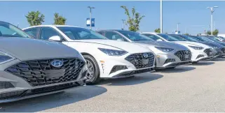  ?? 123RF ?? Hyundai cars on display for sale at a dealership.