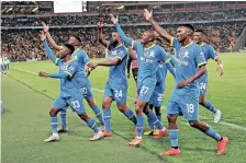  ?? | SAMUEL SHIVAMBU BackpagePi­x ?? SUNDOWNS players celebrate a goal against Pirates.