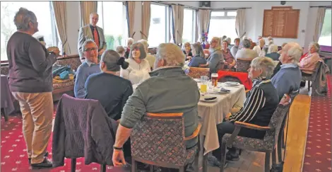  ?? 01_B07elderly­02 ?? Fiona Brown welcomes guests to the lunch.