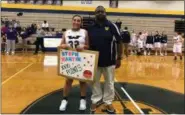  ?? SUBMITTED ?? Stephanie Martin of Wickliffe, shown with Coach Anthony Wilson, scored her 1,000th career point and became the school’s all-time record-holder for points in a two-game span.