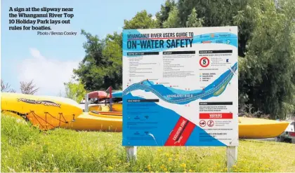  ?? Photo / Bevan Conley ?? A sign at the slipway near the Whanganui River Top 10 Holiday Park lays out rules for boaties.