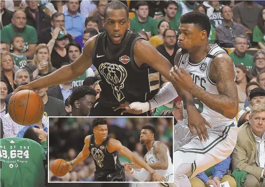  ?? STAFF PHOTO BY CHRISTOPHE­R EVANS ?? ON GUARD: Marcus Smart, who returned to the Celtics lineup for last night’s Game 5, defends against Bucks stars Khris Middleton and Giannis Antetokoun­mpo (inset) at the Garden. Smart also scored nine points in the Celts’ 92-87 victory.