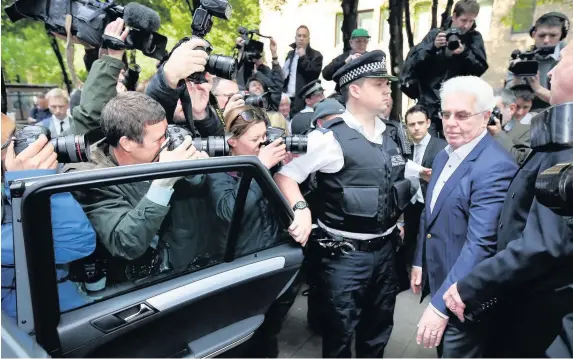  ??  ?? > Max Clifford leaves Southwark Crown Court in April 2014 after being found guilty of eight indecent assaults on women and girls as young as 15