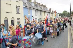  ?? Picture: Photograph­y With Evangeline ?? The colourful procession winds its way through Canterbury