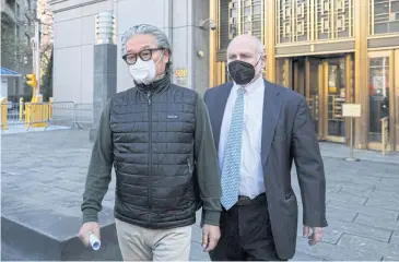  ?? REUTERS ?? Bill Hwang exits a federal courthouse in New York in April 2022. Hwang has been charged with 11 counts of securities fraud, wire fraud, conspiracy, racketeeri­ng and market manipulati­on.