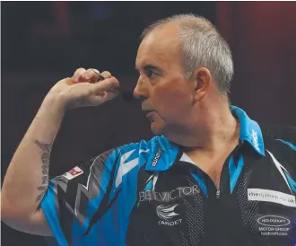  ??  ?? World champion Phil Taylor headlines a list of entrants for the internatio­nal darts series.