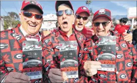  ?? CURTIS COMPTON / AJC ?? Georgia fans Keith Scott (left), J.P. Harris, Harold Franklin, and Keith Barker have their tickets in hand as they arrive for the College Football Playoff Semifinal against Oklahoma at the Rose Bowl Game on Monday in Pasadena, Calif.