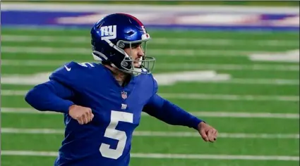  ?? AP Photo/Seth Wenig ?? New York Giants kicker Graham Gano (5) reacts after making a field goal during the second half of an NFL football game against the Philadelph­ia Eagles, on Sunday in East Rutherford, N.J.