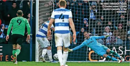  ?? ?? NO WAY THROUGH: Adam Davies saves Charlie Austin’s penalty at the weekend.