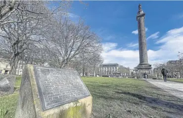  ?? PICTURE: LISA FERGUSON ?? A replacemen­t plaque has been installed at the base of the Melville Monument in St Andrew Square