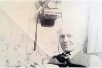  ??  ?? Pictured is Harry Peberdy in his King Street home, with the phone in the background that was installed so that his bosses at W.M Corah could contact him at any time. Sent in by Looking Back reader Alan Godber.