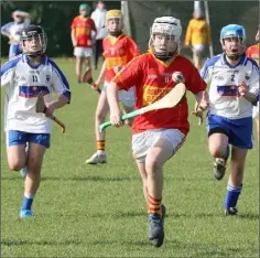  ??  ?? Lucas Fitzpatric­k is chased by Darragh Steadmond and Lorcan Doyle.