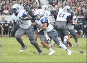  ?? STAFF PHOTO BY JOHN NISWANDER ?? Lackey senior Jonathan Thompson rushes the ball during Friday’s game at Chopticon in a Southern Maryland Athletic Conference crossover matchup. Thompson finished with two rushing touchdowns as Lackey prevailed over the Braves by a final score of 34-7.