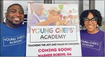  ?? BECKY PURSER/THE TELEGRAPH ?? Daphne and Tarell Register, owners of the Young Chefs Academy franchise opening in Warner Robins, join outside their new space being transforme­d into a cooking school for children. Classes will be open to children age 4 through high school.