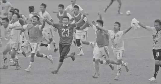  ?? ERANGA JAYAWARDEN­A/AP ?? Bhutan’s players celebrate their victory against Sri Lanka in the first leg of their 2018 World Cup qualifier.