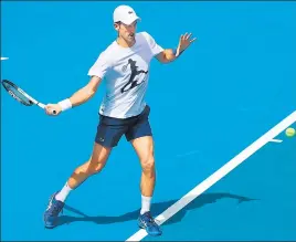  ?? AFP ?? World No 1 Novak Djokovic takes part in a training session in Melbourne a day after a court overturned the Australian government’s decision to cancel his visa.