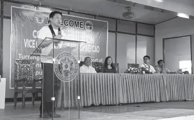  ?? Photo courtesy of the Chinese Consulate General’s Office in Davao City ?? DAVAO Chinese Consul General Li Lin delivers a speech during the turnover of the one million renminbi (P7.2 million) donation from the Chinese government to the quakedamag­ed Cor Jesu College in Digos City on Wednesday.