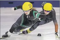  ?? PHOTO COURTESY OF JIM CRAWFORD ?? Carly Connell, left, earned the Nancy White Award as the top female athlete for 2016-17 at Speed Skate P.E.I.’s recent annual awards banquet.