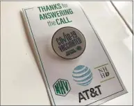  ?? Brian Zahn / Hearst Connecticu­t Media ?? One of the 5,000 lapel pins AT&T has donated to the city of New Haven to give out to individual­s who have received one of the COVID-19 vaccines.