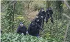  ?? ?? ▲ Police search Kersal Dale wetlands after human remains were found