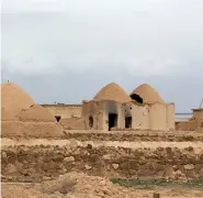  ??  ?? Beehive houses near Aleppo; built this way due to no wood.