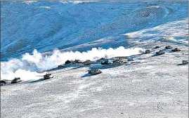  ?? AP ?? Tanks pull back from the banks of Pangong Tso lake region, in Ladakh along the India-China border