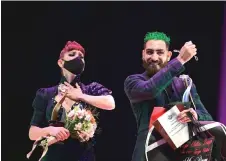  ?? — AFP photo ?? Muzyka and Casal celebrate after winning the Tango Stage final competitio­n in the framework of the Tango Dance World Championsh­ip in Buenos Aires.