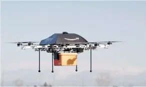  ?? AMAZON / AFP / GETTY IMAGES FILES ?? Limited battery life, the expense of IT programmin­g and other issues are likely to prevent using drones for routine package delivery in the short term, experts say.