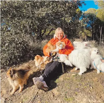  ?? ?? Sally with her dogs in Rueda, Castilla y León, Spain