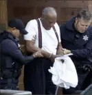  ?? Jacqueline Larma/ Associated Press ?? In September, Bill Cosby is escorted out of the Montgomery County Correction­al Facility, following his sentencing.