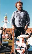  ?? COURTESY PHOTO ?? Steve Terrell with baby Molly Terrell at 1981 Zozobra.