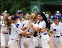  ?? ERIC BONZAR — THE MORNING JOURNAL ?? Keystone celebrates earning their 17th state final four berth and fourth in as many years after topping Defiance on May 26.